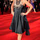 Illustration for article titled Horrific Hair, Gorgeous Gowns & Bass At Britain's Bafta Awards